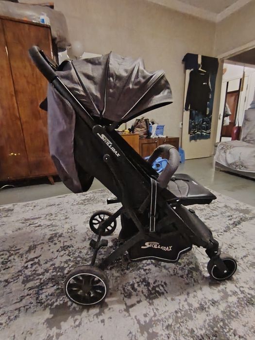 Коляска для детей чемодан.