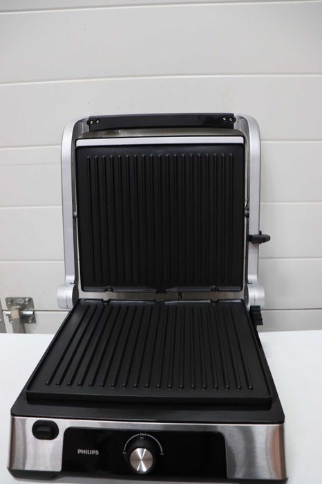 Контактна скара Philips - Регулируема температура 60°C - 200°C. Голяма повърхност за готвене и висока мощност. Подвижни незалепващи плочи  (HD6301/90)