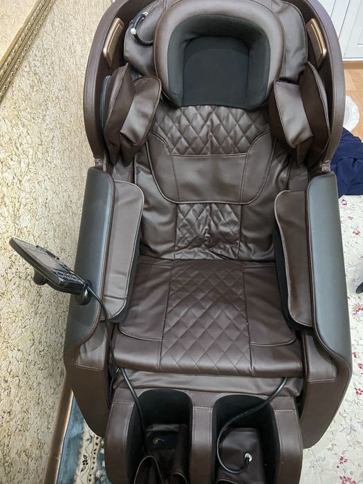 Массажный кресло