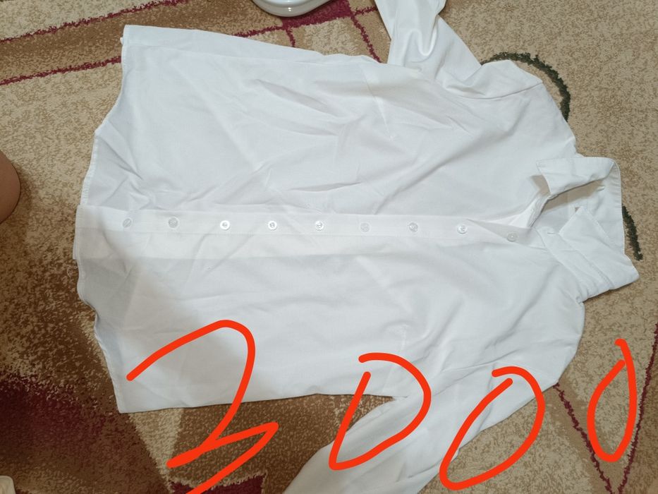 Продам костюмы и юбки