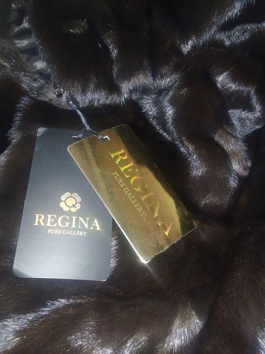 Натуральные норковые шубы большого размера.