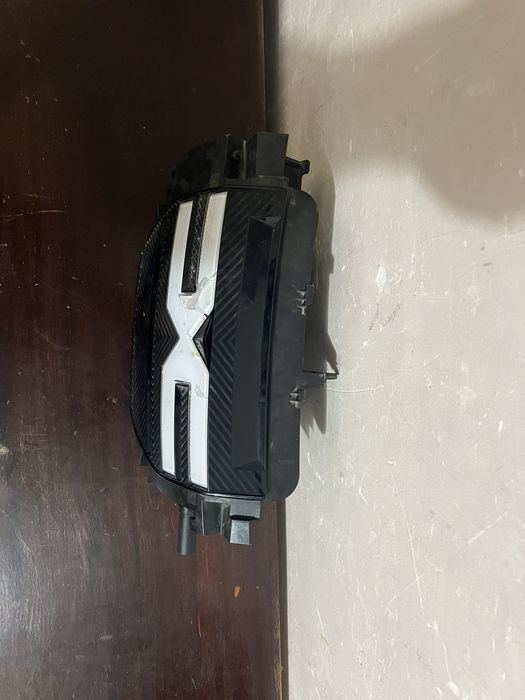 Grila  radiator Dacia Spring  incarcare