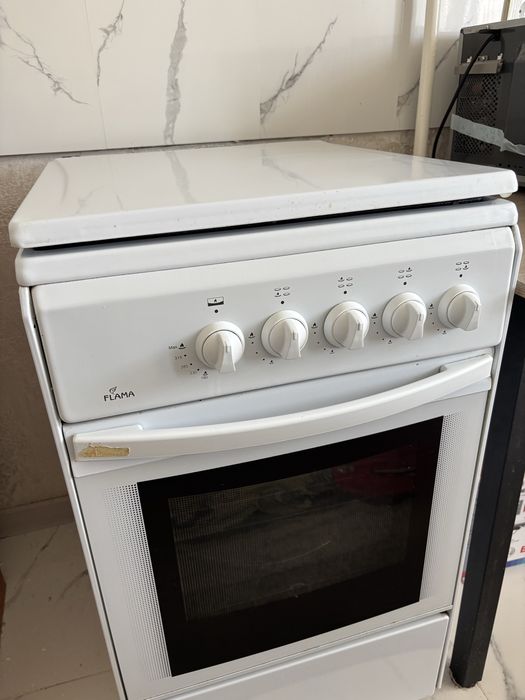 Газовая плита с духовкой