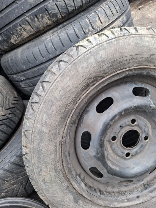 Vand 1 roata R 14 opel cu anvelopa 175 65 14 buna m+s