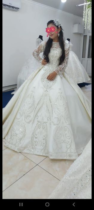 Продаю свадебные платье по цене проката