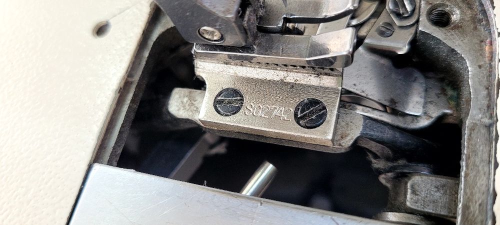 mecanic întreținere și reparații mașini de cusut