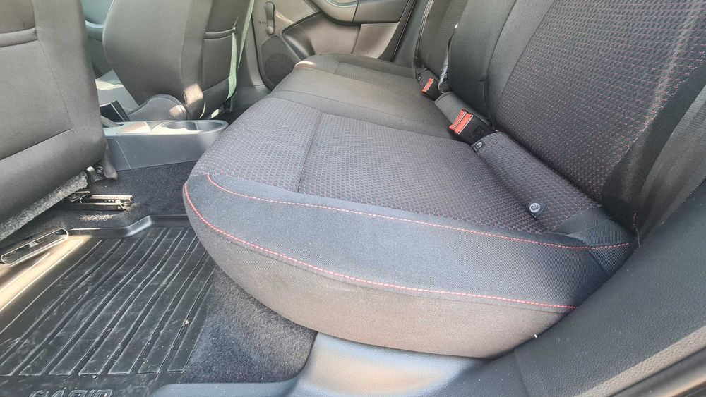 Skoda Rapid  > culoare visinie  > 105 cai  > 113 500 km > an 2013