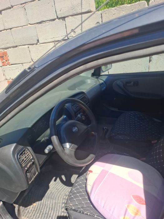 Nissan primera 1990 года
