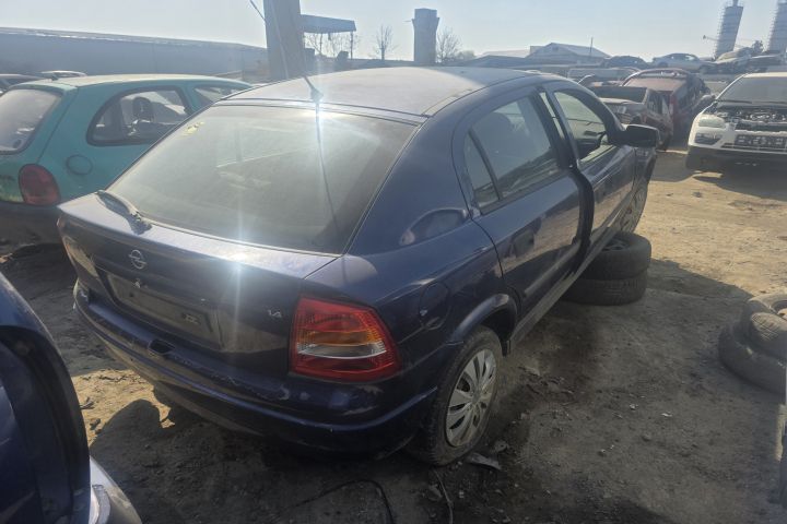 Far stanga Opel Astra 2003 1.4 MT (90 hp)