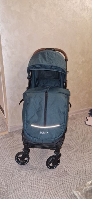 Продам прогулочную коляску Tomix Luna Lux