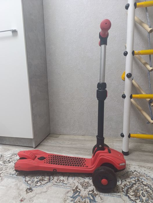 детский самокат на 5-8 лет