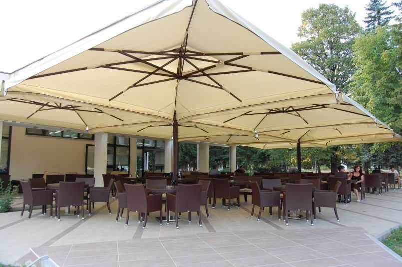 Навесы и садовые зонты – уют и защита для вашего сада