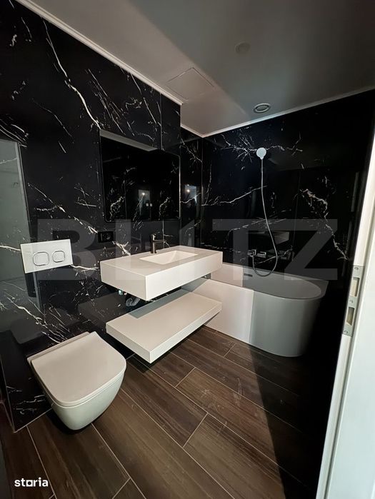 Apartament 3 camere, 2 bai, parcare, zona UMF