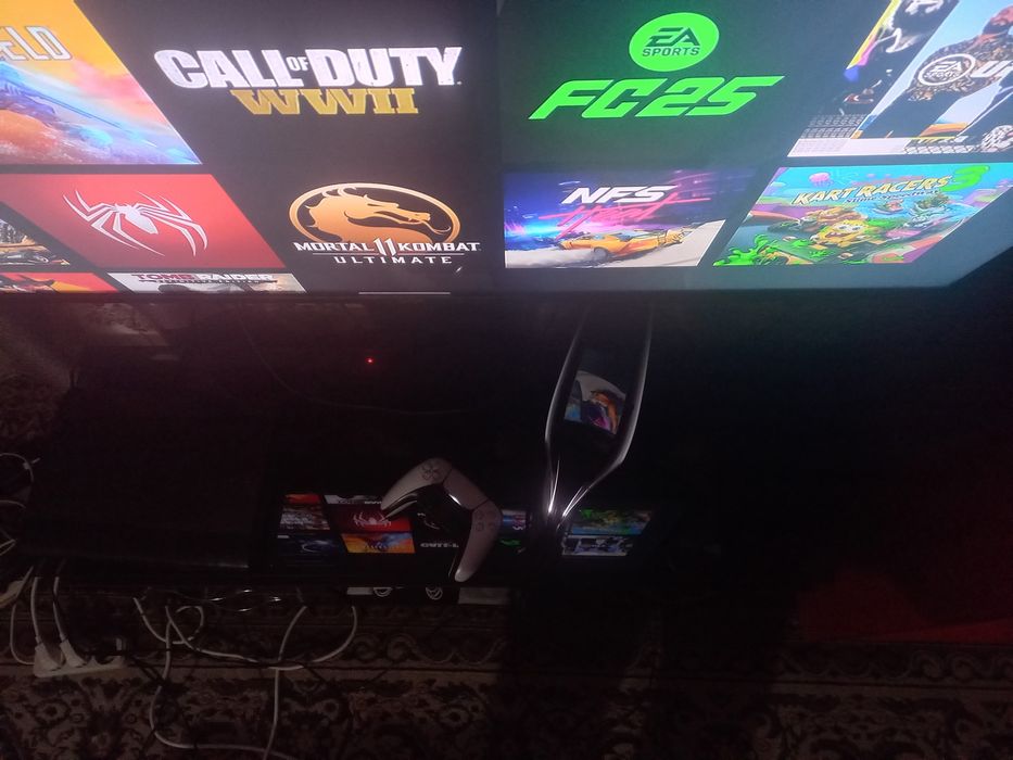 PS5 slim holati ideal tiniq 1TB hotirasi o'yinlar yozigan karobka bor.