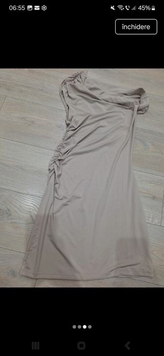 Rochiță mulata deși este M pe eticheta, ea este potrivita pt.S