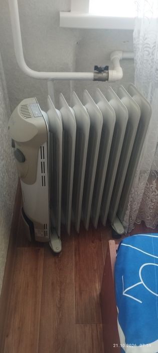 Масляный обогреватель