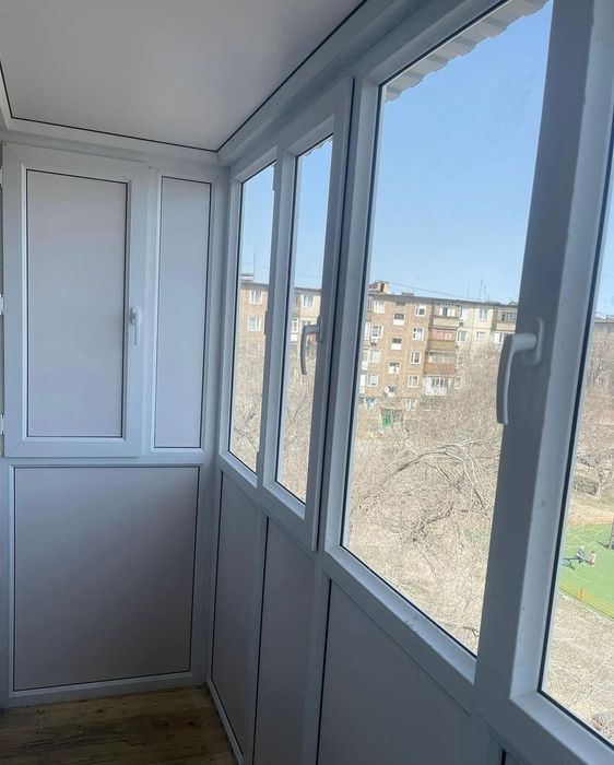 Пластиковые окна двери балконы