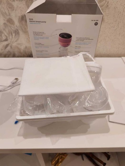 Молокоотсос электронный