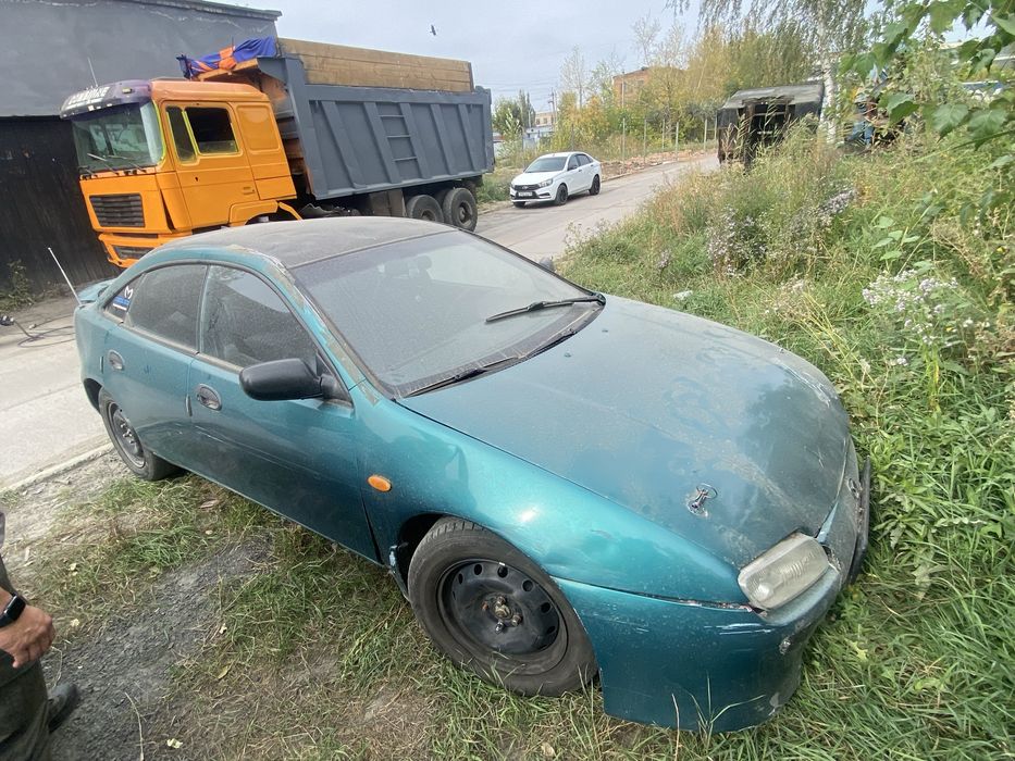 Мазда 323 fe 1995 год