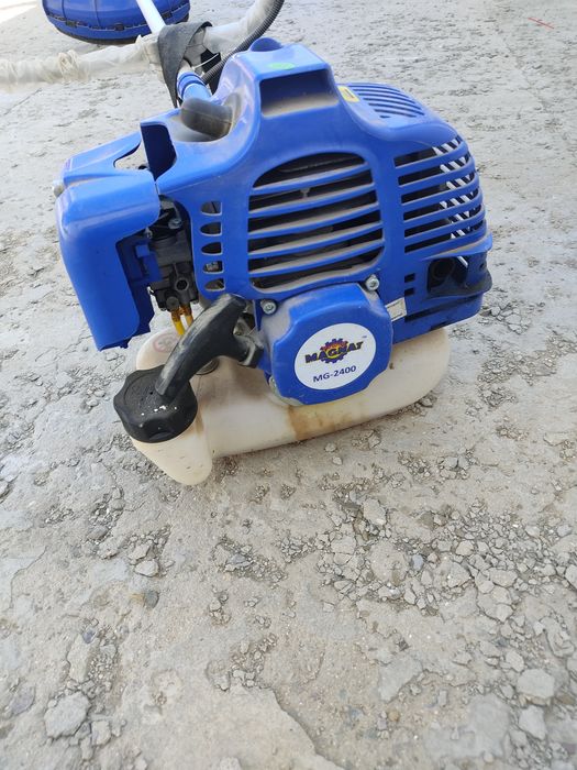 Продам садовый триммер magnat 2400