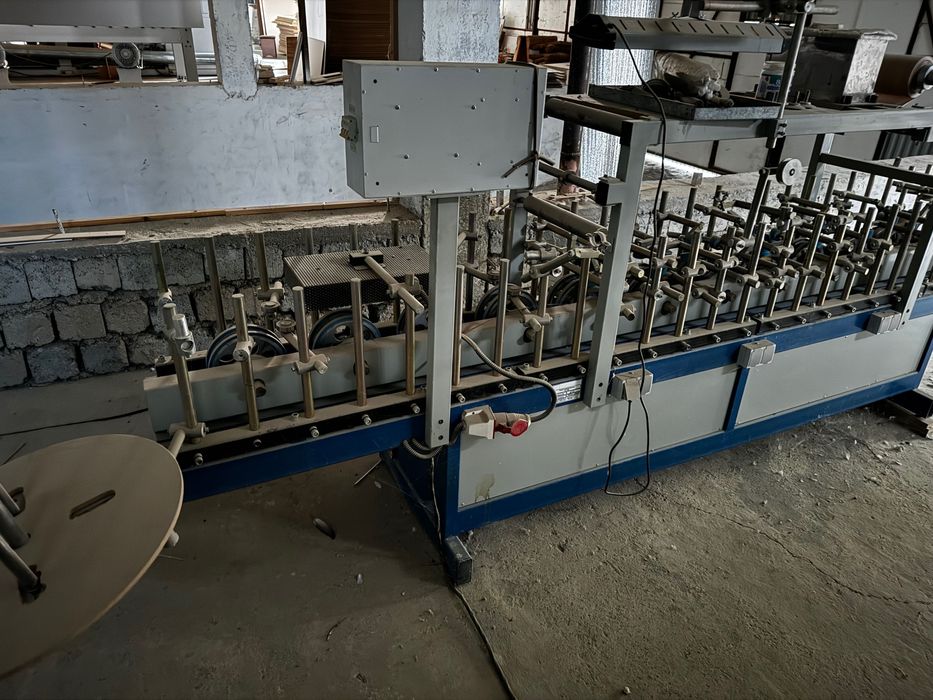 Станок окутывания мебельных профилей / mebel plyonka urash stanogi