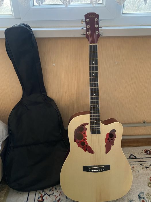 Гитара новый колданылмаган