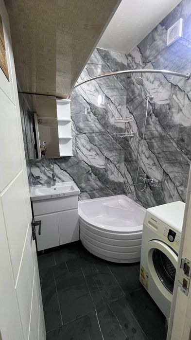 Кафельшик плиточник