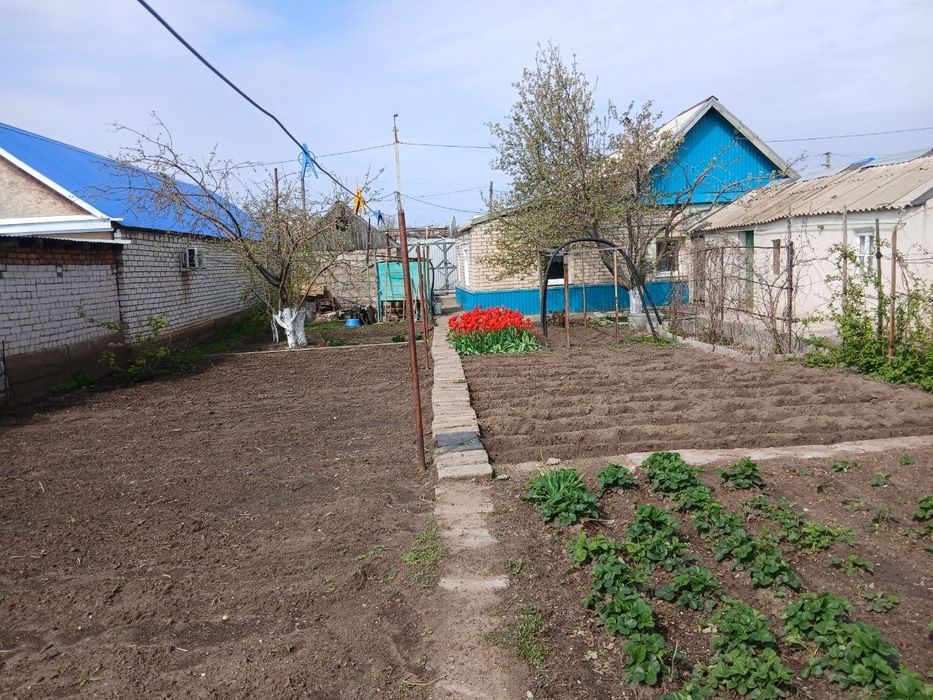 Продам дом саманный обложенный кирпичем