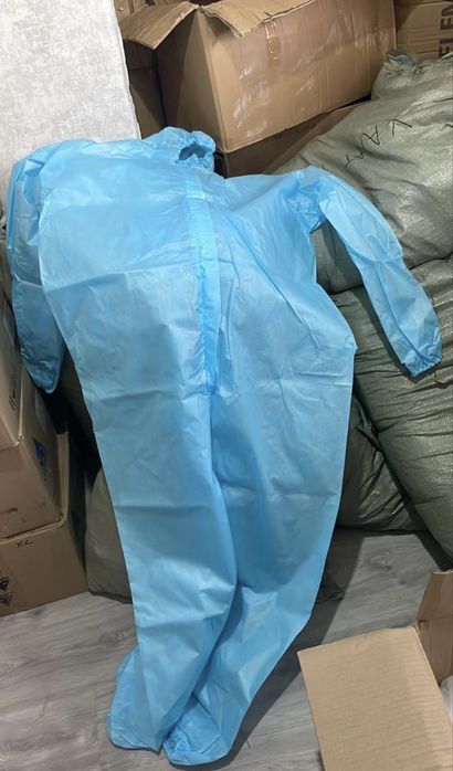 Комбинезоны одноразовые