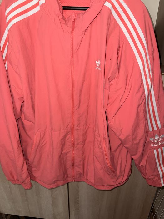 Geaca anti vânt Adidas, marimea XL, culoare corai, poliamida, stare foarte buna