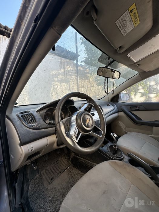 Kia forte 2009 xolati ortacha remont qivorish kerak