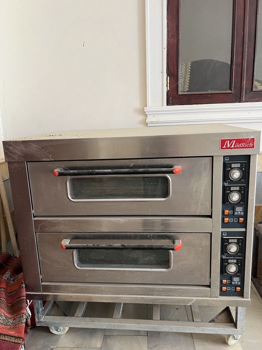 Озгина ишлатилган духовка котлет пиширайдиган ва сув аппарат  сотилади