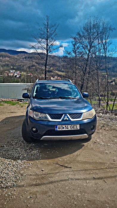 Vând sau schimb Mitsubishi outlander