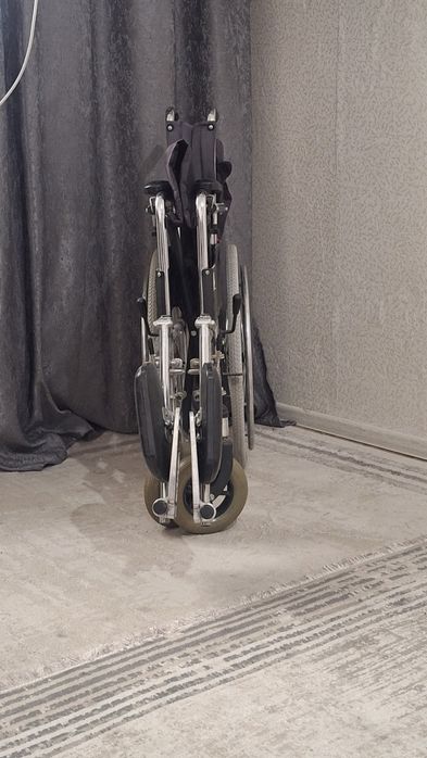 Инвалидная коляска