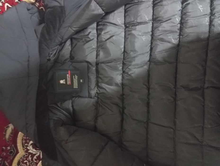 Продам пуховик в отличном состояние
