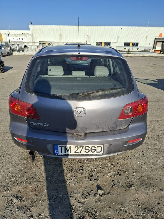 Mazda 3 , 1.4 Benzina , an2004 , 84cai