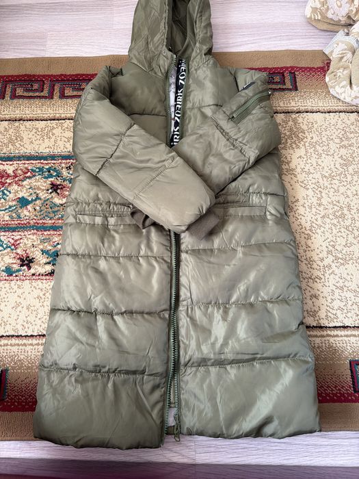 Много разных курток зимних