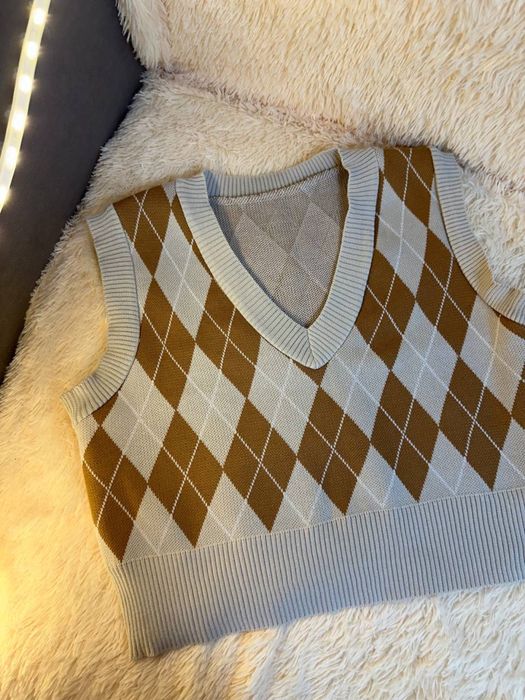 короткая жилетка