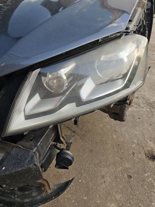 Far stanga passat B7 bi-xenon + DRL U.K