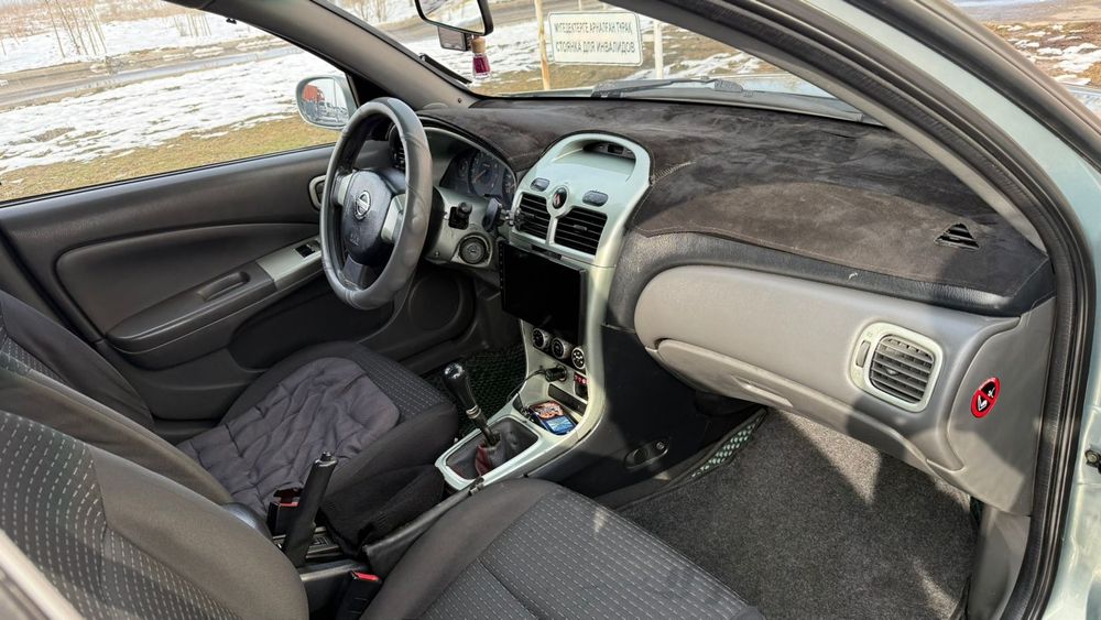 Машина ниссан алмера класик