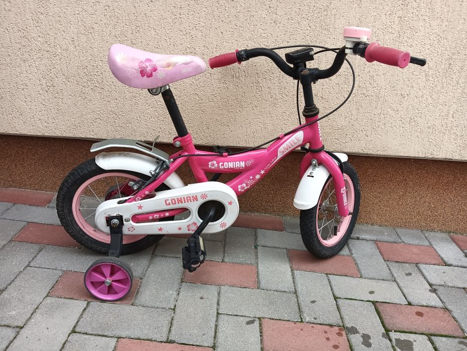 Vând bicicleta pentru copii roz