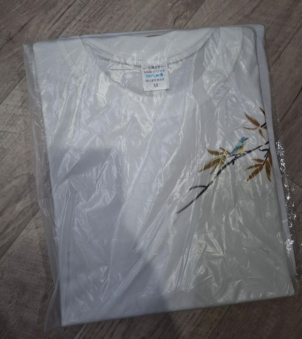 Продам новые футболки