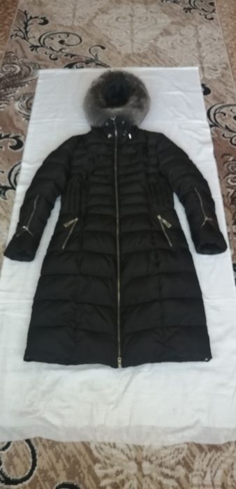 Продам женский пуховик