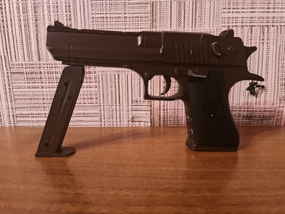 Пистолет игрушечный для детей