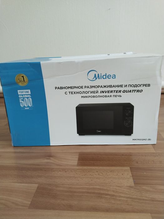 Продам микроволновую печь Midea