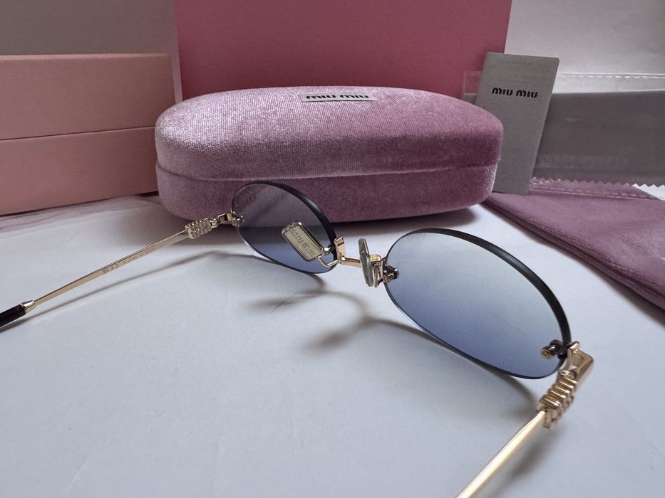 Ochelari de soare Miu Miu Oval-Rimless SMUA54 51-20 140, Noi