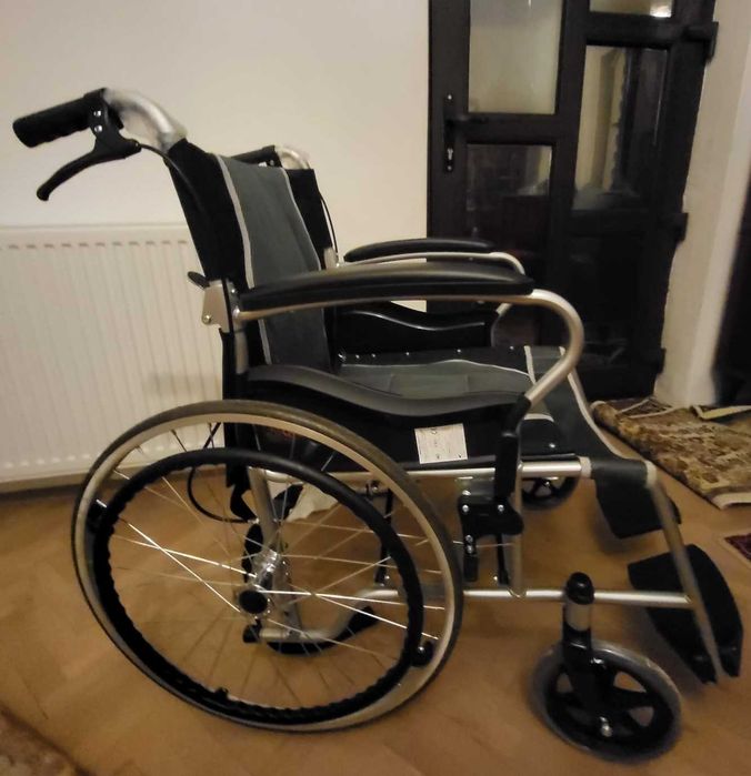 urgent scaun cu rotile cu actionare manuala nou