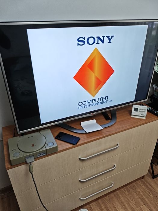 Consolă PlayStation 1 (PS1) Modată Cip MM3 + 2 Manete + Jocuri, Funcțională Made in Japan