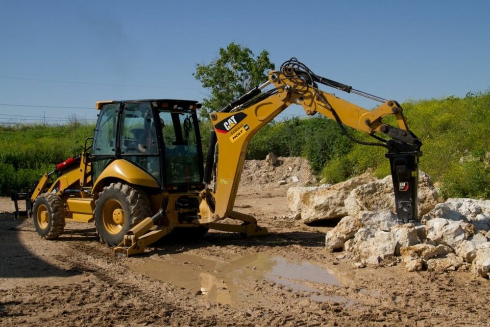 Экскаватор-погрузчик 3в1