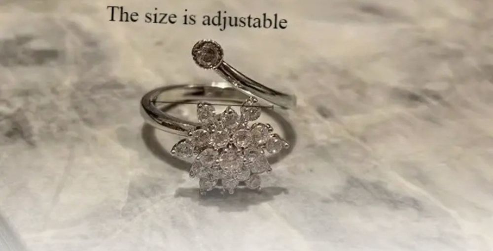 Кольцо подсолнух вращается на пальце